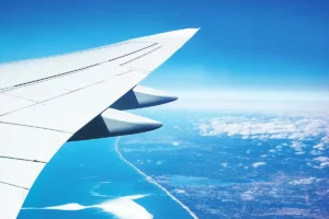 view of airliner wing from passenger window